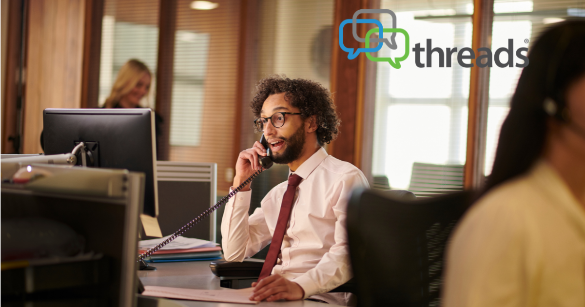 Man in office on the phone